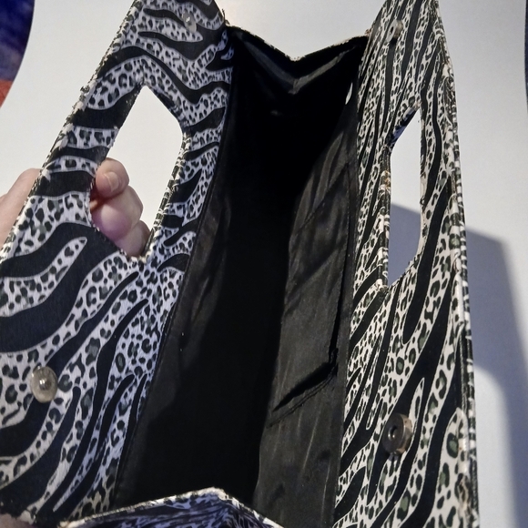 Zebra Print Clutch. Magnetic Snap Closures. - Picture 5 of 8